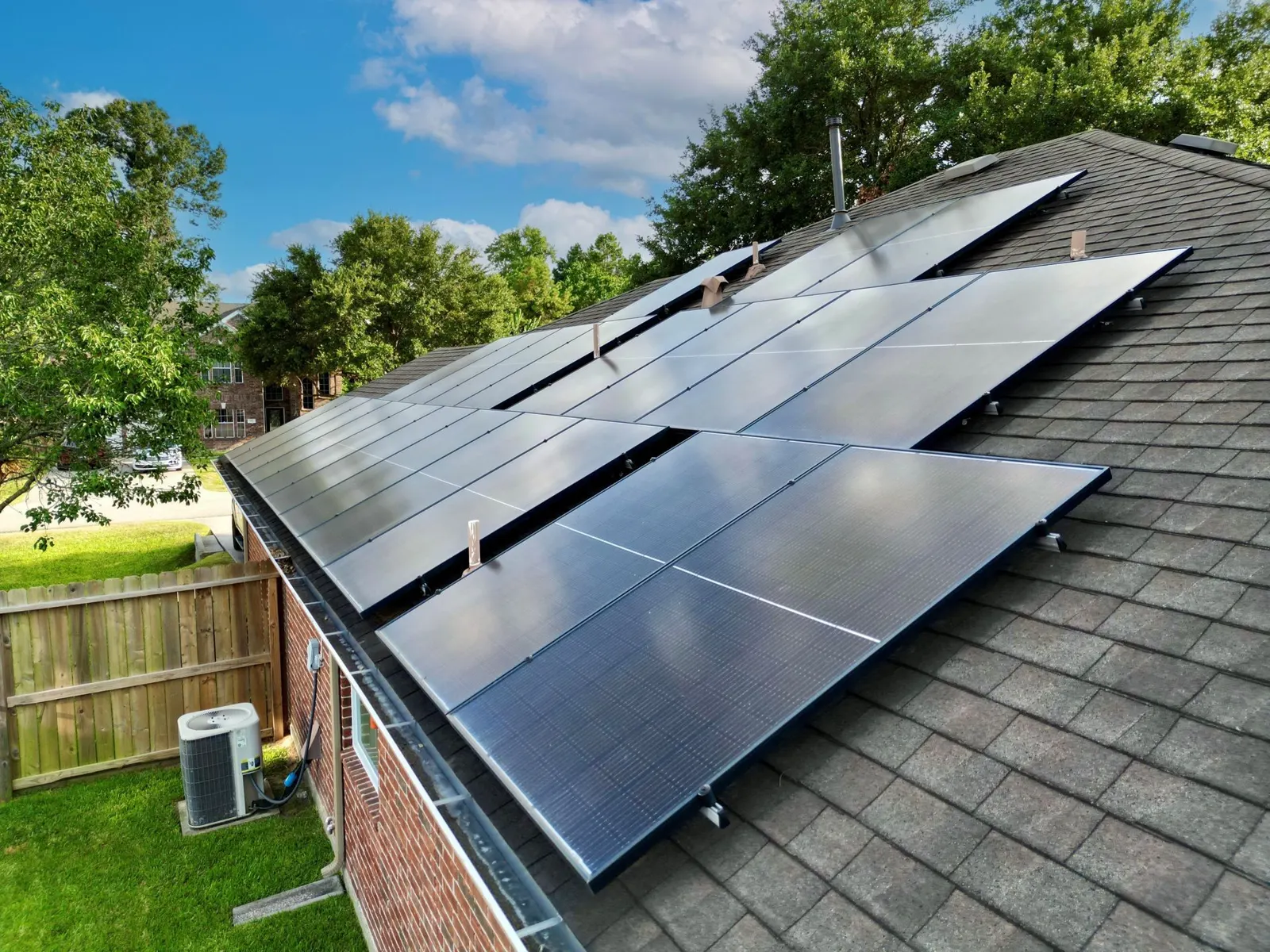 Solar panels installed on a residential shingle roof